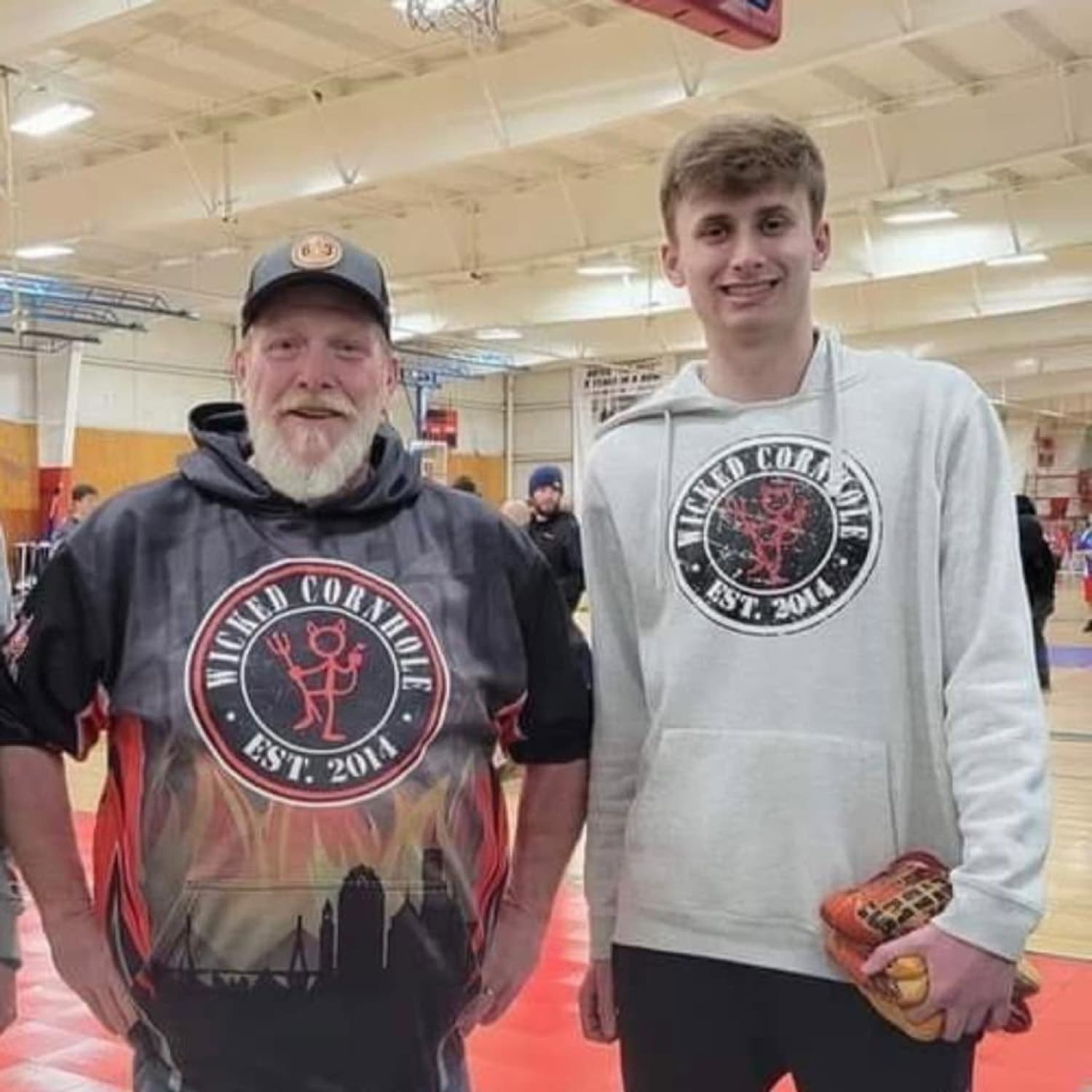 Zack and Bruce Taylor in Wicked Cornhole gear