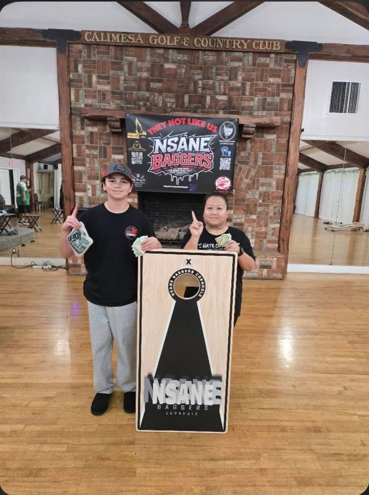 Ethan Farias on the podium in Stickside gear