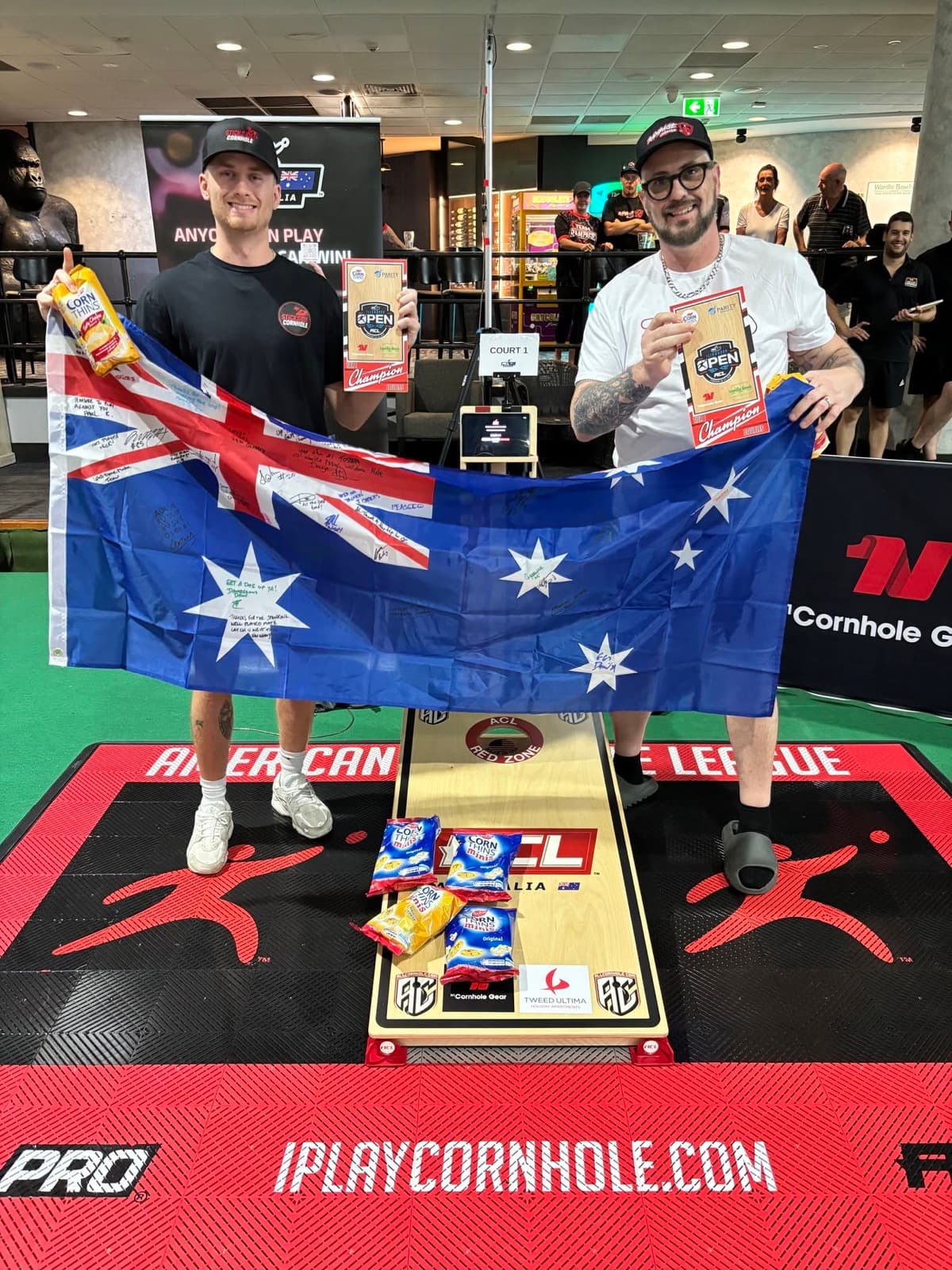 Zack and Shawn with the flag after winning the Australia Open